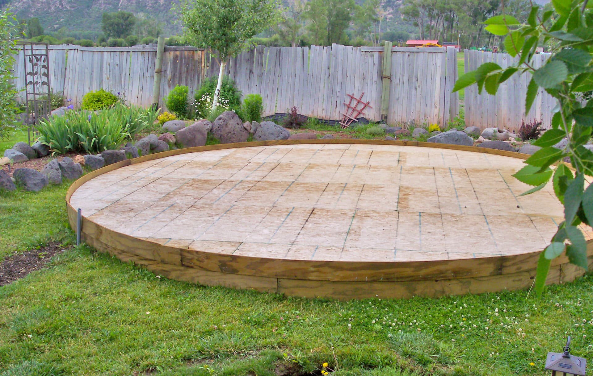 Simple round wooden yurt deck